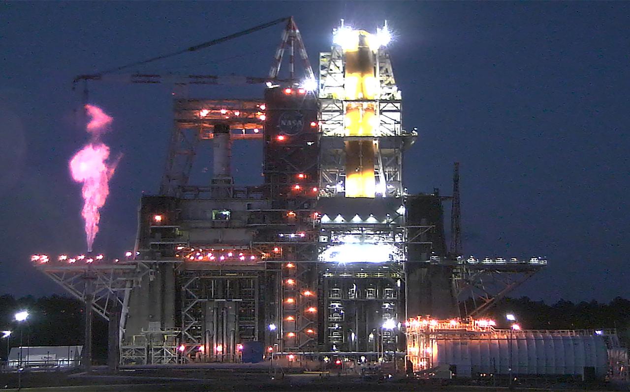 Operators at the B-2 Test Stand at Stennis Space Center near Bay St. Louis, Mississippi, conducted a wet dress rehearsal for the hot fire test of the core stage of NASA’s Space Launch System on Dec. 21, 2020. In this image, liquid oxygen can be seen venting near the top of the installed core stage. Following the wet dress rehearsal, operators will conduct a full hot fire test of the core stage and its four RS-25 engines. The hot fire will conclude a series of eight Green Run tests of all core stage systems before it is transported to Kennedy Space Center for launch on the Artemis I mission.